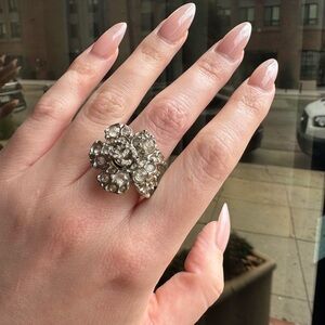 CHANEL Elegant Silver Floral Ring